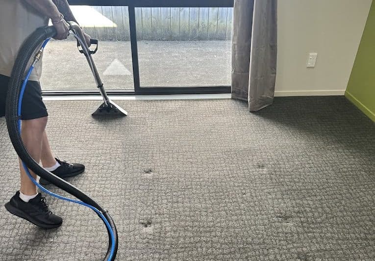 Fern Cleaning team using extraction equipment to clean a carpet